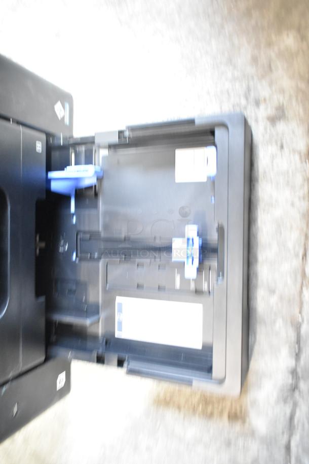 Epson WF-7840 scanner copier printer, 100-120 volts, 1 phase, open paper tray, black, used condition.