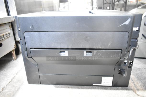 Epson WF-7840 scanner copier printer, 100-120V, 1 phase. Black exterior, visible ports, minor wear, rear view.