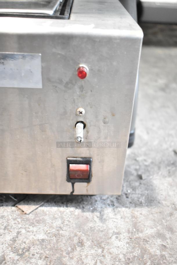 Brain Power Inc DRS1090 Automatic 4-Stroke Gradient Lensor, metal casing, manual switch, red indicator light, used condition.