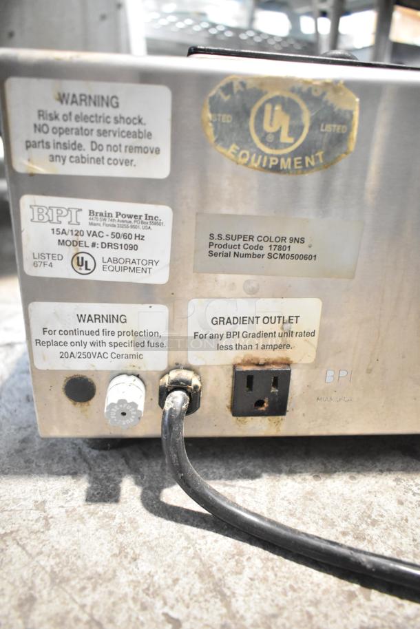 Brain Power Inc DRS1090 Automatic 4-Stroke Gradient Lensor, 120V, 1 Phase. Features safety warnings and outlet details.