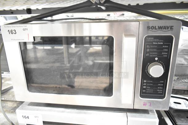 2017 Solwave 180MW1000D commercial microwave oven, stainless steel, 120V, 1 phase. Features control dial and menu guide.