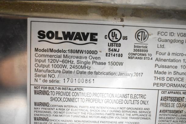2017 Solwave 180MW1000D commercial microwave, 120V, 1 phase, 1000W output. UL Listed, manufactured January 2017. Model, safety labels visible.