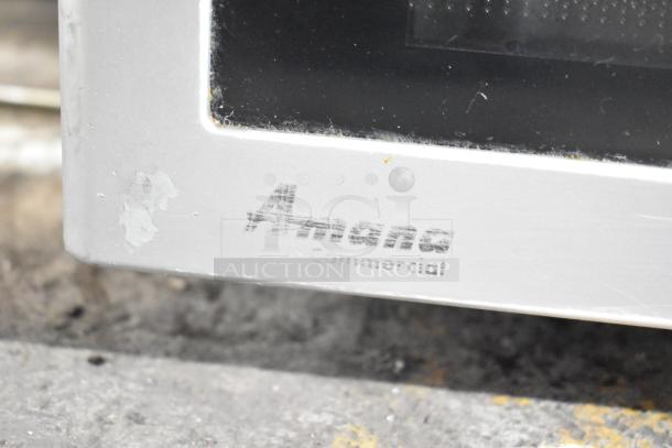 2016 Amana RMS10TS Commercial Microwave, 120V, 1 Phase. Visible wear on the exterior with Amana branding.