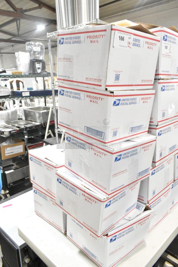 Seven USPS Priority Mail boxes containing various candies: Sour Patch Kids, Sweet Tarts, Jelly Beans, Peeps.