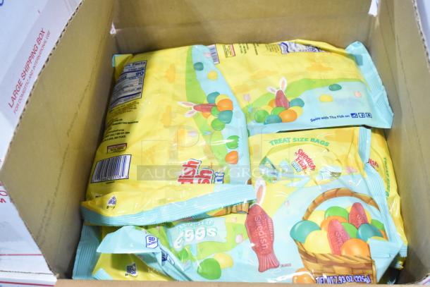 Box with various candy packs including Swedish Fish and Sour Patch Kids, label shows nutritional information and barcode.