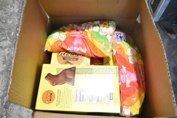 Box containing Jef Puffed marshmallows, Reeses chocolate bunny, and assorted candies. Ten boxes available. 