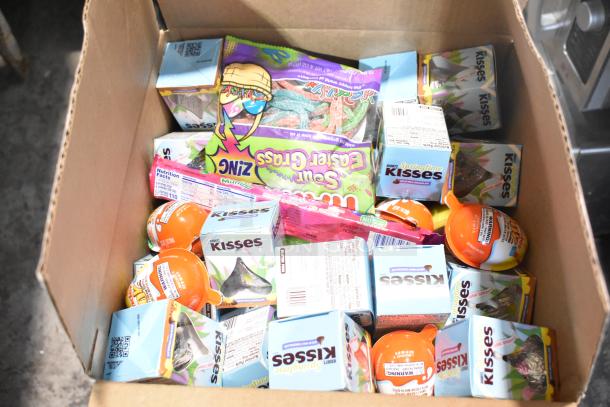 Box containing various candies, including Jef Puffed Marshmallows, Hershey's Kisses, and Sour Patch Kids. 10 times bid value.