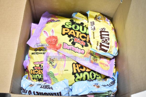 10 boxes of mixed candy including Sour Patch Kids Bunnies, M&M's, and Hershey's Kisses in retail packaging.