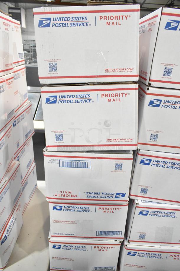 10 USPS Priority Mail boxes filled with various candies, including chocolate bunny and Haribo Sour Easter Grass, offer 10 times your bid.