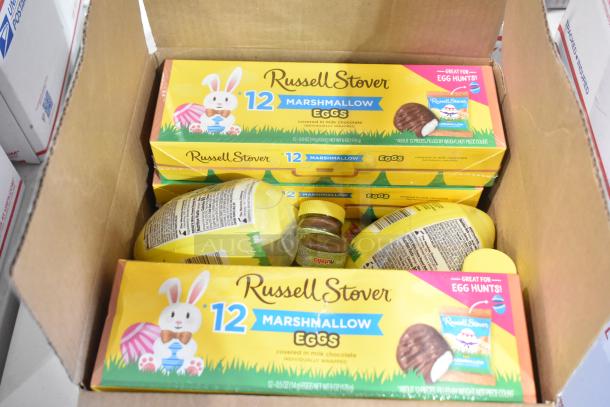Box of Russell Stover Marshmallow Eggs featuring colorful packaging. Perfect for egg hunts. Other candy not visible.