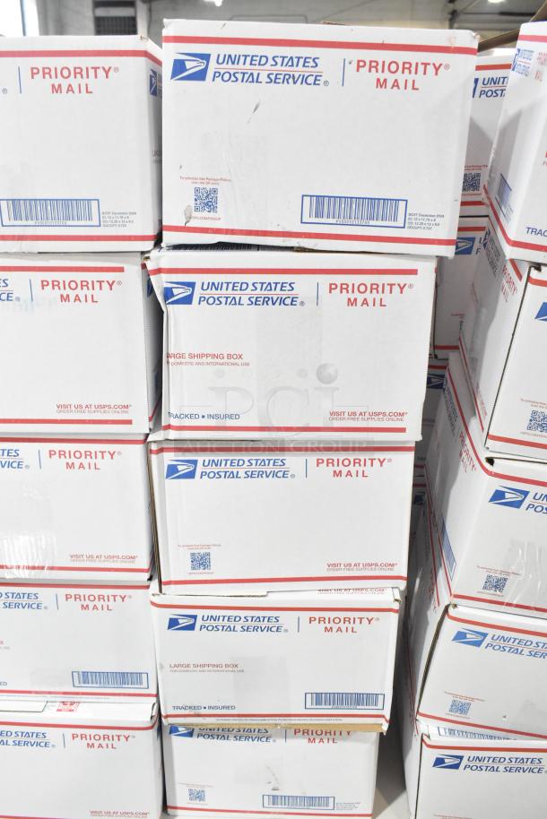 Stack of USPS Priority Mail boxes containing candy including Peeps, chocolate bunnies, Nutella, and Kinder Joys. Auction item offers 10 times your bid. Boxes are labeled and ready for shipment.