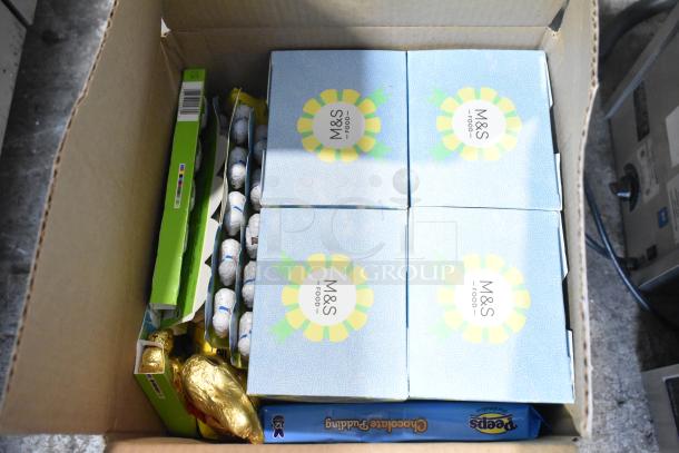 10 boxes of candy including Reeses, Cotton Candy Peeps, Chocolate Bunnies; M&S Food label, sealed in original packaging.