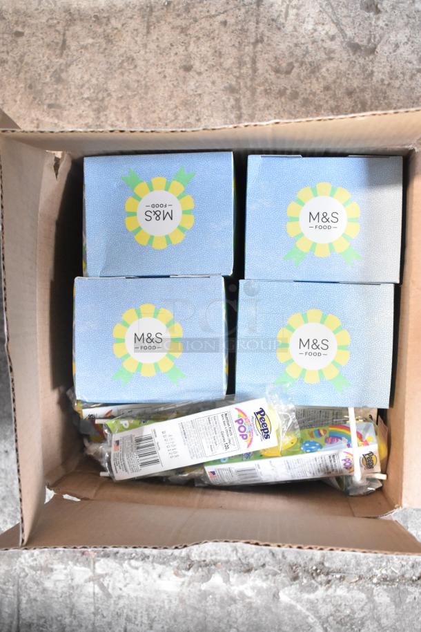 10 boxes of candy including M&S food items and Peeps pops in a cardboard box, ideal for bulk purchase.