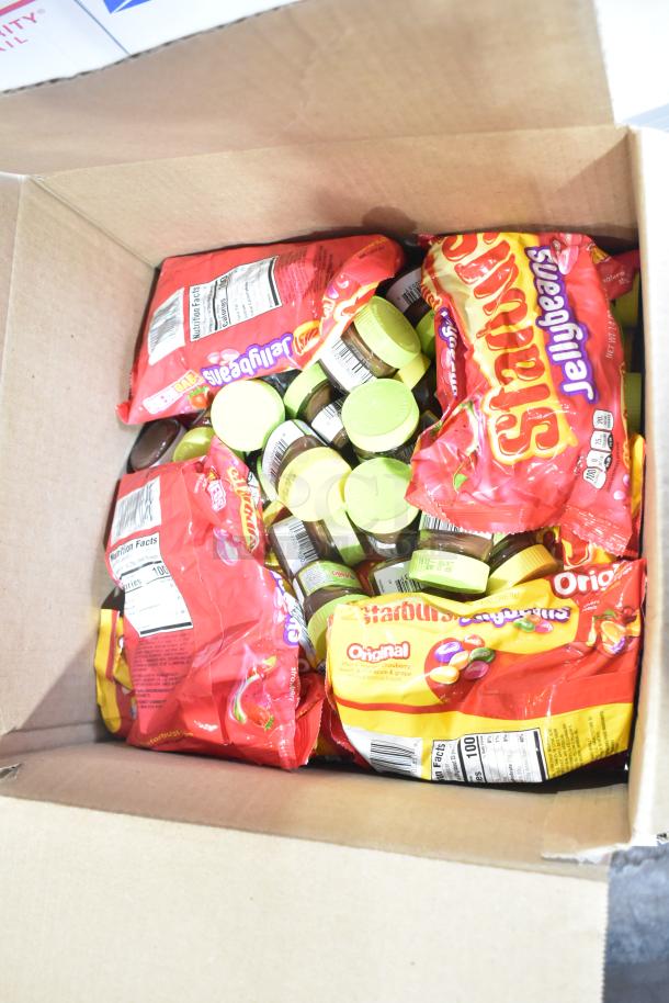 Box of Starburst Jellybeans, visible labels, assorted jars with green lids, unopened condition.