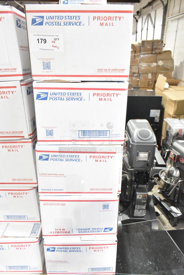 10 USPS boxes labeled "Priority Mail" containing candy such as Junior Mints, Kinder Joy Eggs, Kisses, Yellow Peeps. Lot 179.