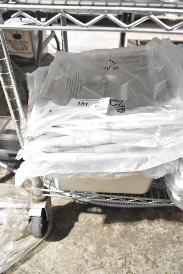 29 new scratch and dent items, including Choice 407OPL2/4 ladles and Vigor stainless bins, on a shelf.