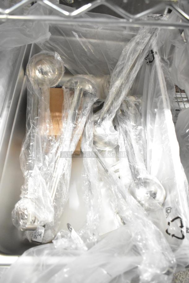 29 brand new scratch and dent items including Choice 2 oz and 4 oz ladles, and Vigor stainless steel drop-in bins.