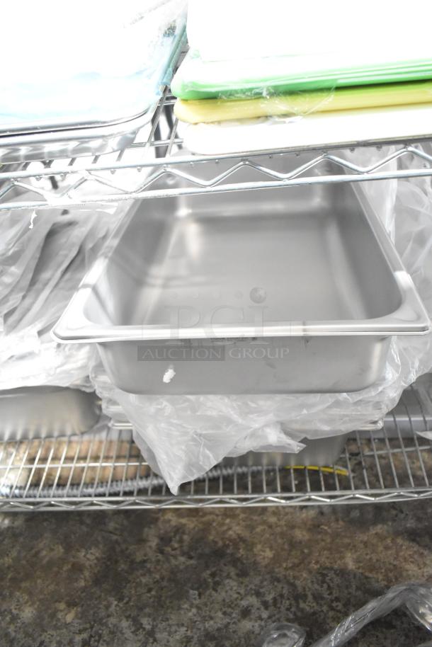 Brand new scratch and dent Vigor stainless steel drop-in bin on a shelf. Includes ladles Choice 407OPL2, 407OPL4.