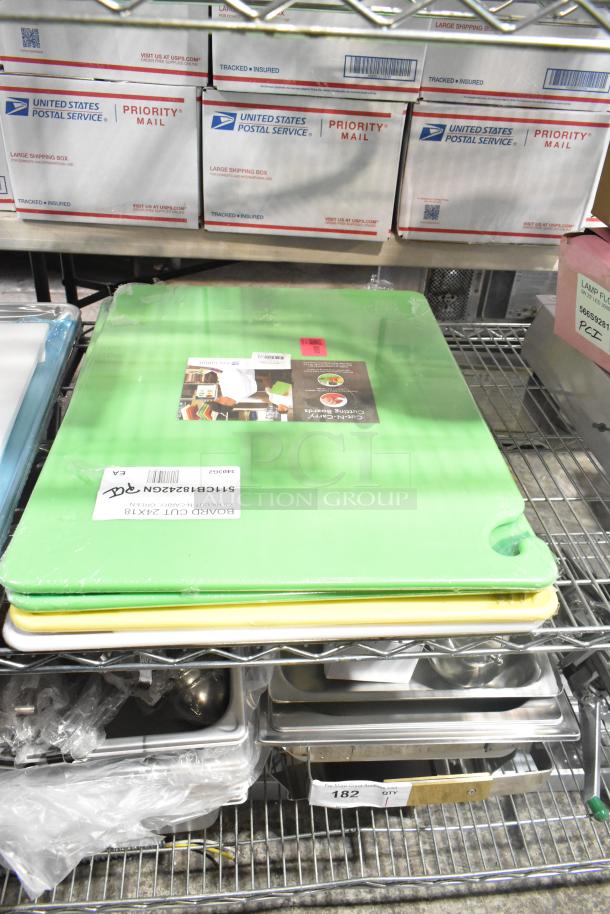 Eight new scratch and dent items including green and yellow cutting boards, metal baking pans, and kitchenware on shelves.