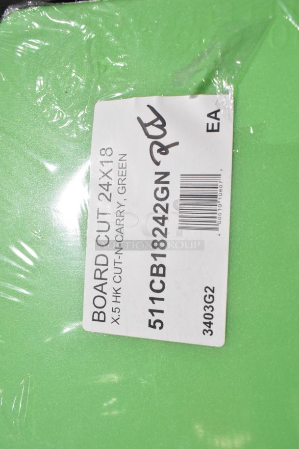 Green cutting board, 24x18 inches, brand new with minor imperfections. Label states: "X.5 HK Cut-N-Carry, 511CB18242GN."