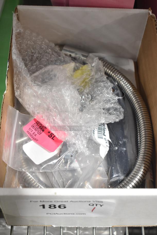 Box containing Cleveland KE53437-1 Spark Ignition, labeled "Brand New Scratch and Dent", with coiled tube and packaging.