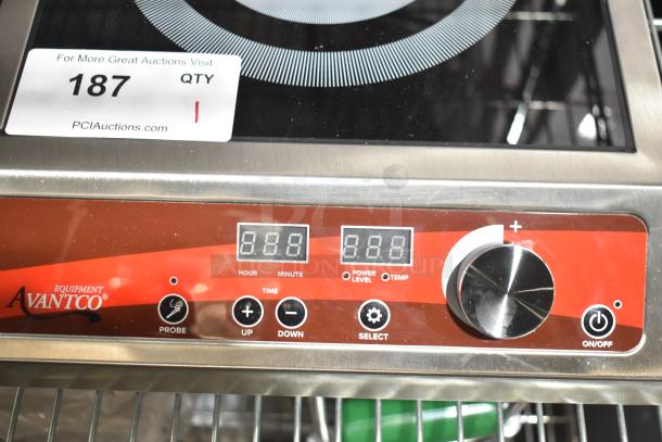 Brand new Avantco countertop single burner induction range, scratch and dent model. Features digital display, power level controls, and Avantco branding. Auction tag with "187" visible.