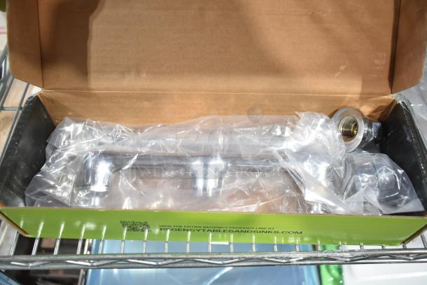 Brand new Regency 600FWM812 wall mount faucet, 8" centers, 12" swing spout, slight scratches; in original packaging.