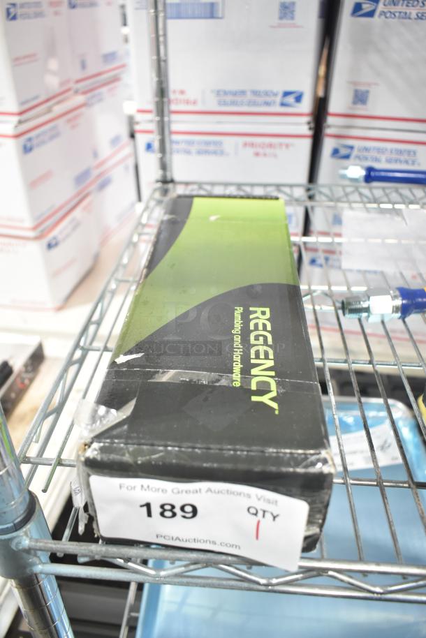 Brand new Regency 600FWM812 wall mount faucet box with scratches and dents, 8" centers, 12" swing spout. Lot 189.