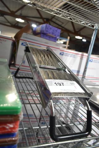 BRAND NEW Choice 407SSMANO stainless steel mandoline, scratch and dent condition, on metal rack with auction label.