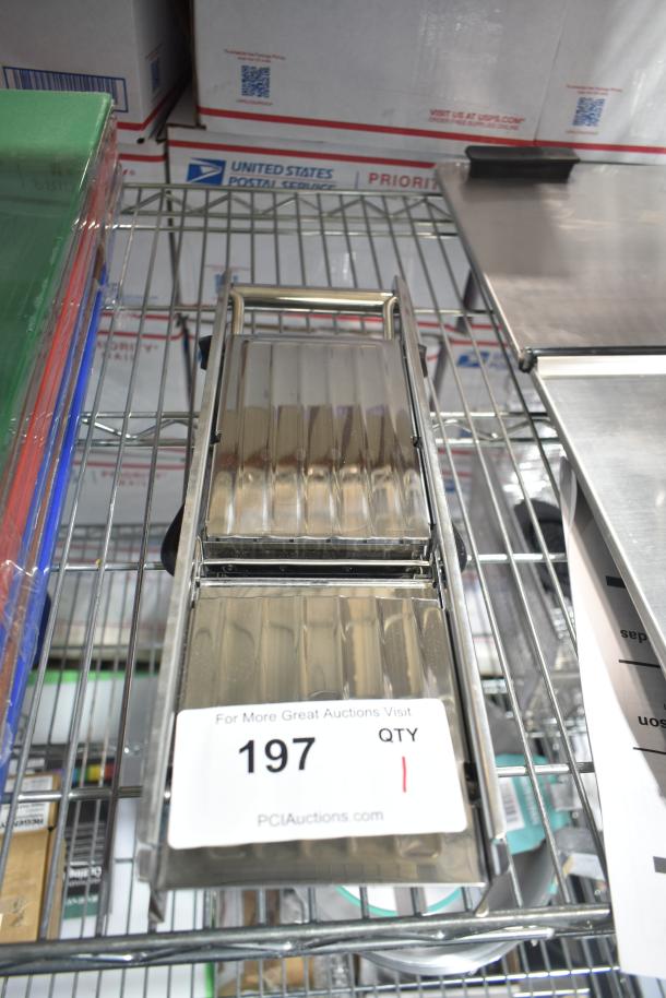 Brand new "Choice 407SSMANO" stainless steel mandoline. Slight cosmetic scratches. Tag shows auction info: lot 197, qty 1.