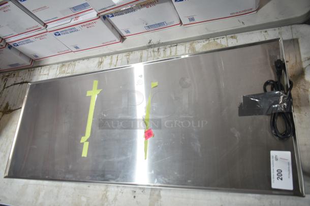BRAND NEW SCRATCH AND DENT! ServIt ENSSW4820 48" stainless steel heated shelf warmer, minor scratches, cord attached.