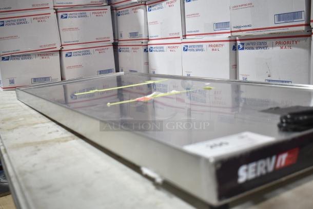 BRAND NEW SCRATCH AND DENT! ServIt ENSSW4820, 48" stainless steel heated shelf warmer. Minor scratches visible.