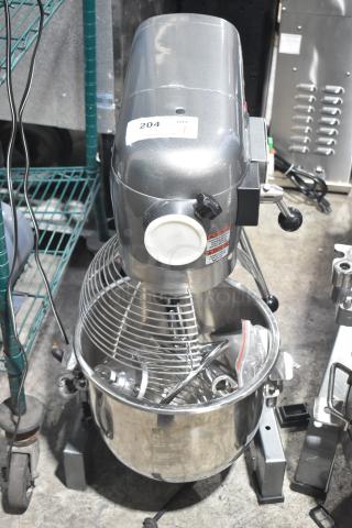 Brand new Avantco 177MX20H 20 qt planetary dough mixer with bowl guard, attachments, 120V, slight scratches, model label visible.