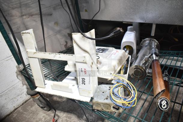 Four various industrial items including a Kidde fire suppression system box and a beer tap tower, shown in used condition.