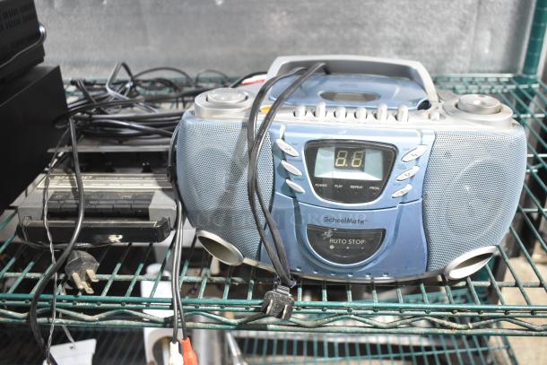 Four audio devices: Panasonic PV-8455S VHS player, Pioneer CT-W404R cassette deck, Sharp RD-661AV cassette recorder, SchoolMate SC-5050 CD player, visible on a shelf with cables.