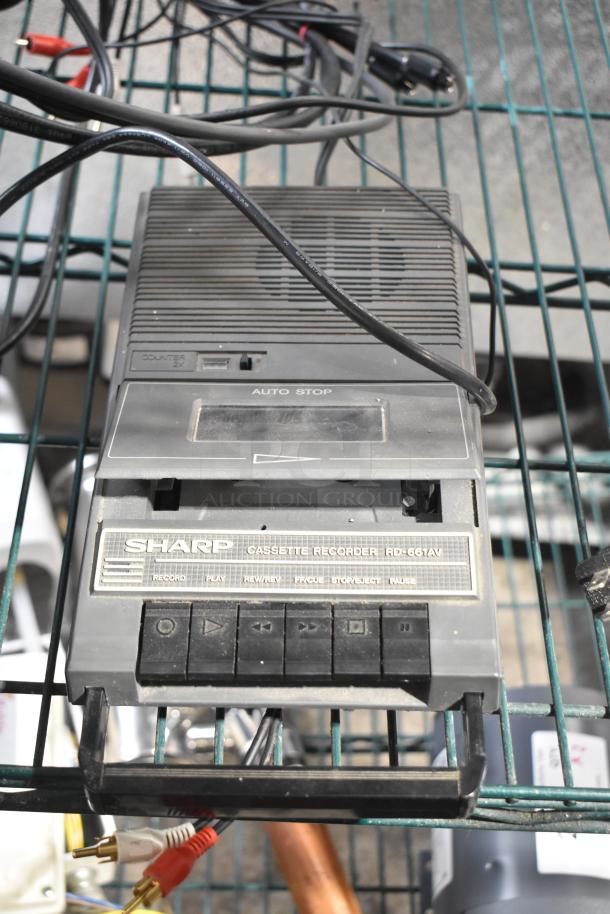 Sharp RD-661AV Cassette Recorder, visible dust, with front panel buttons for record, play, rewr, and auto stop. Cables attached.
