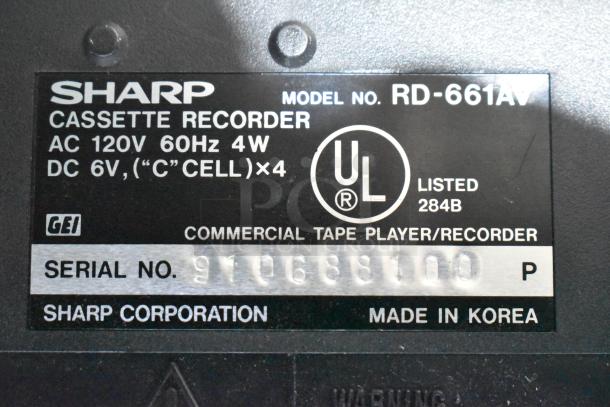 Label on Sharp RD-661AV Cassette Recorder. Indicates power specs, UL listing, serial number, and "Made in Korea."