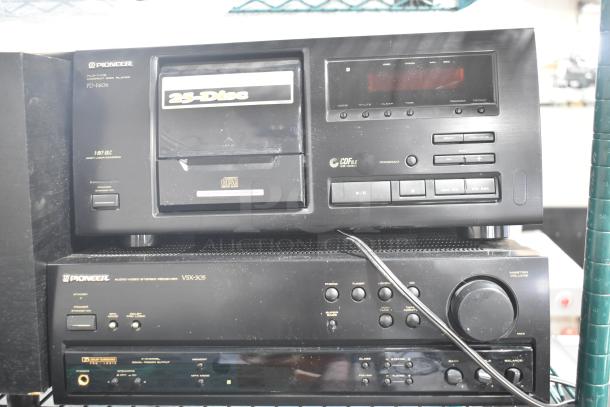Pioneer PD-F606 CD player and VSX-305 stereo receiver, black finish, dust visible, includes Philco VHS player, speakers.