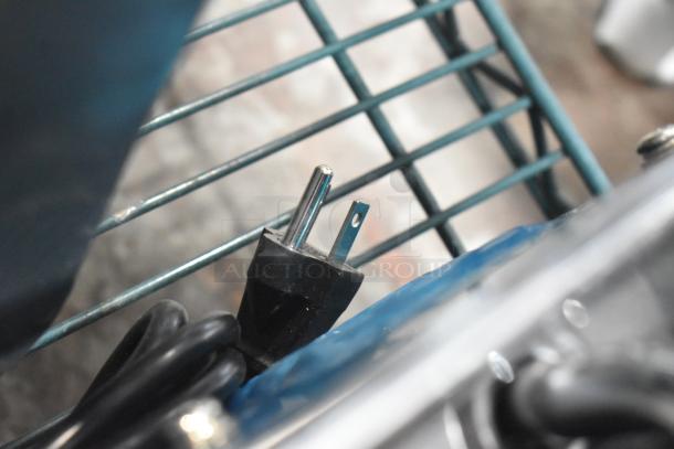 Avantco PG400T Panini Grill plug and power cord detail, new condition, showcasing sturdy design for commercial use.