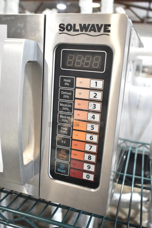 LIKE NEW! Solwave EM025FJT-S0SA00 stainless steel commercial microwave, push button controls, model 180MW1000SS.