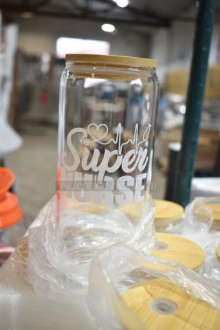 Brand new Super Nurse glass cup with bamboo lid, featuring etched design. Lot of 9, labeled "Scratch and Dent."