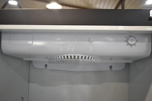 BRAND NEW KoolMore KM-MDR-1GD-10C commercial refrigerator interior, showing fan and temperature control dial.