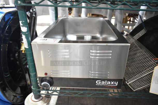 Brand new Galaxy GW50E 12" x 20" electric countertop food warmer, scratch and dent, 120V, 1 phase, stainless steel.