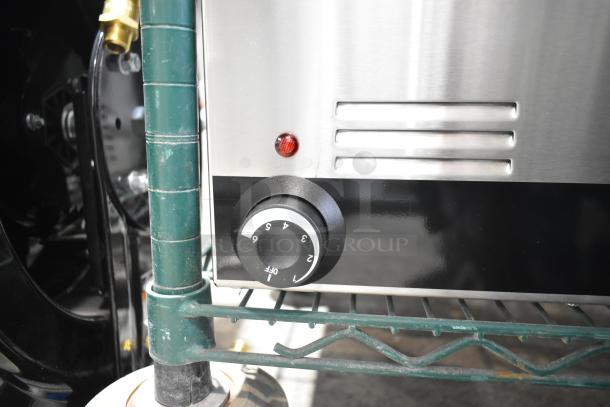 Brand new Galaxy GW50E 12" x 20" electric countertop food warmer, control knob visible, slight scratch.