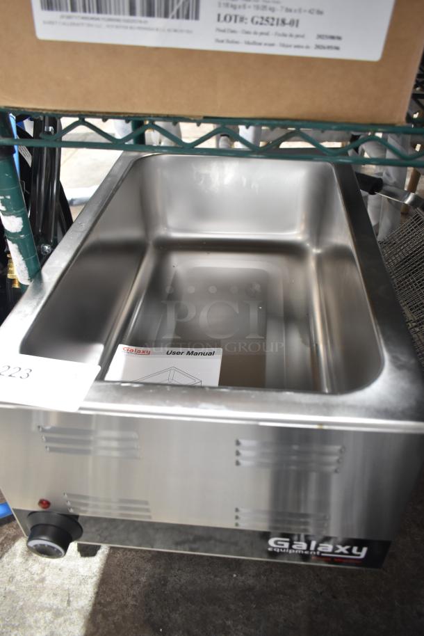 Brand new Galaxy GW50E electric countertop food warmer, 12"x20", 120V, with minor scratches. Includes user manual.