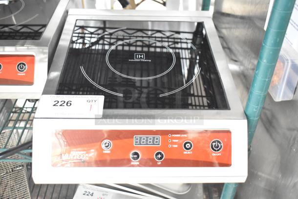 Brand new Avantco 177IC3500 countertop induction range, 208-240V, with minor scratches. Digital controls visible.