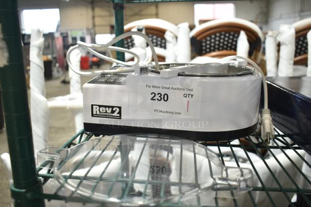 BRAND NEW ChocoVision Revolation 2 Chocolate Tempering Machine, Scratch and Dent, 1.5 lb. Capacity, 110V, visible auction tag.