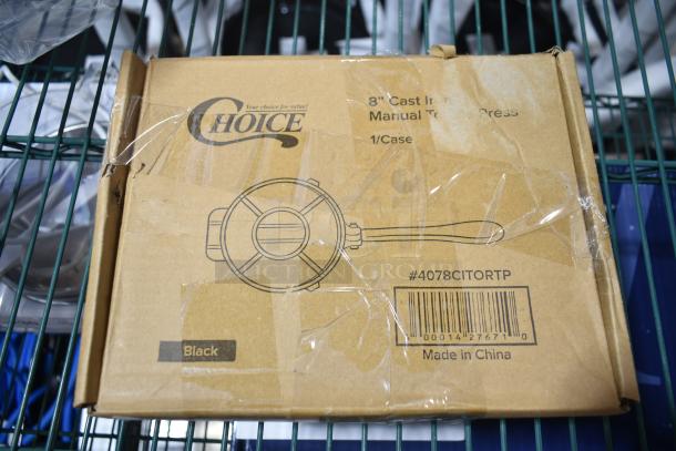 Box of Choice 4078CITORTP 8" Cast Iron Tortilla Press, labeled "Black," with visible scratches and dents. Made in China.