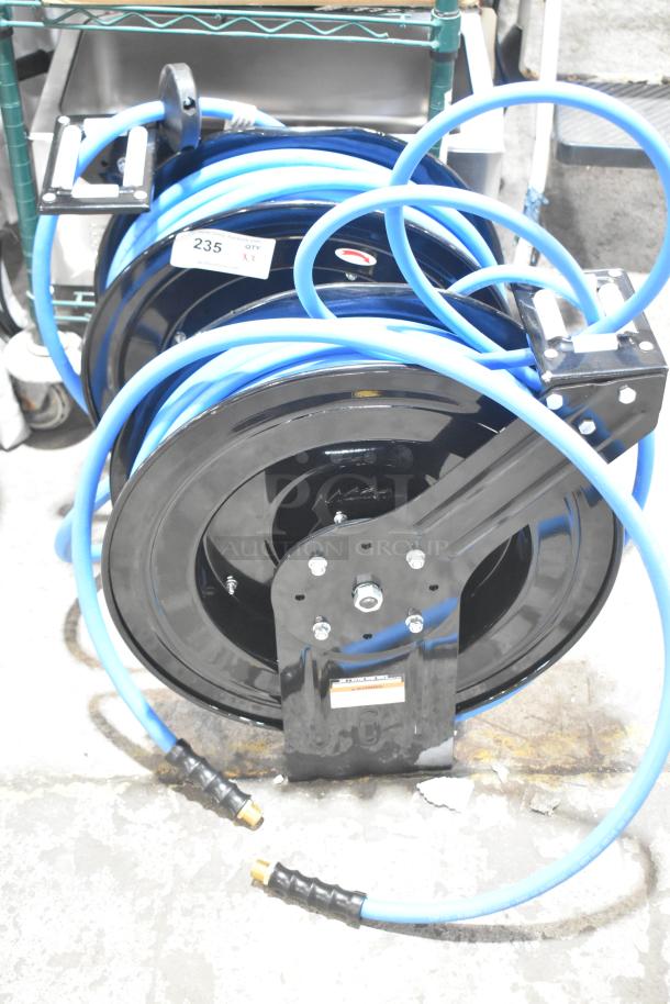 Brand new Regency open powder-coated steel air hose reel with hose. Scratch and dent condition. Includes tags.