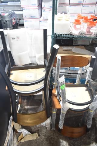 Set of 4 brand new scratch and dent chairs; dining height, wood and metal. Includes wrapping; labeled for auction.